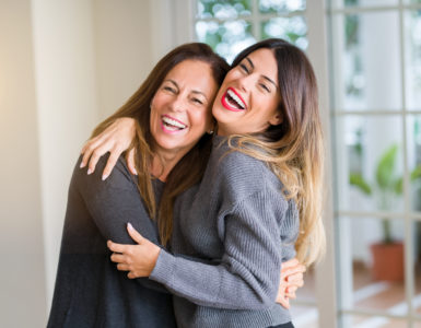 relationship expert - mom adult daughter hug