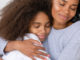 more empathy - mom and daughter hug