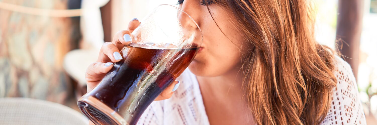 popular sweeteners - woman drinking soda