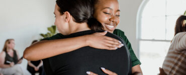 support a friend - women hugging