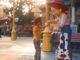 child and character at Disneyland