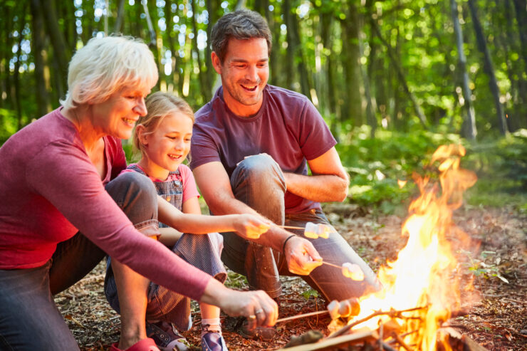 family around campfire