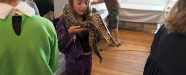 girl holding snake