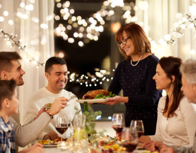 french-inspired - woman hosting dinner