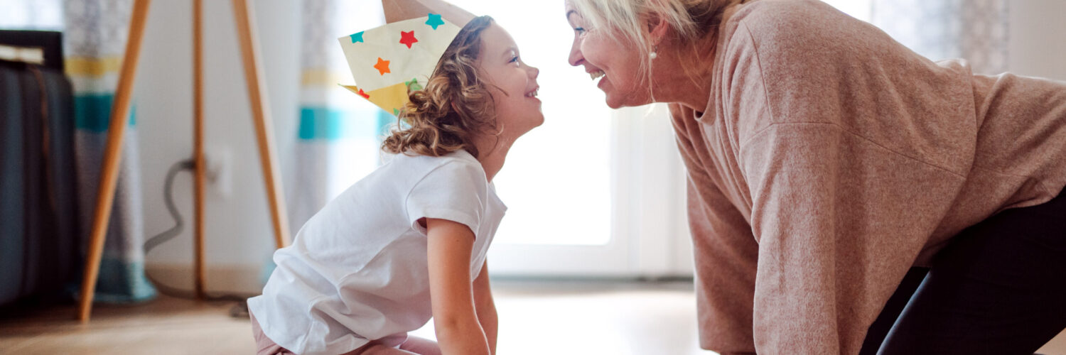 chatgpt - grandma and grandchild playing