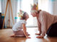chatgpt - grandma and grandchild playing