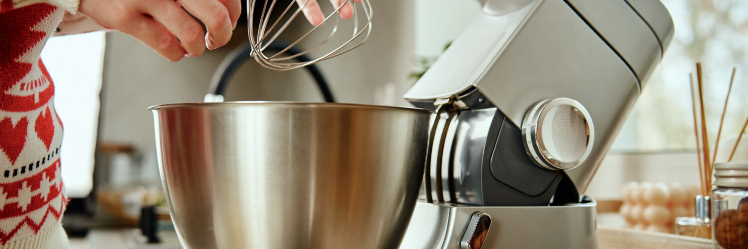 kitchenaid - woman using mixer