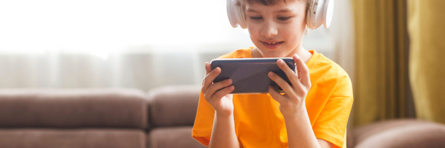 mobile games - kid playing game