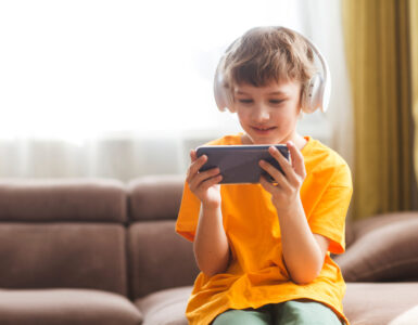 mobile games - kid playing game