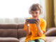 mobile games - kid playing game