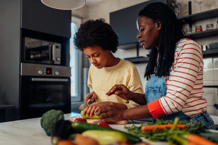food lessons - mom and child preparing food