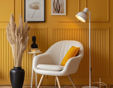 chair and lamp sitting area with yellow wall